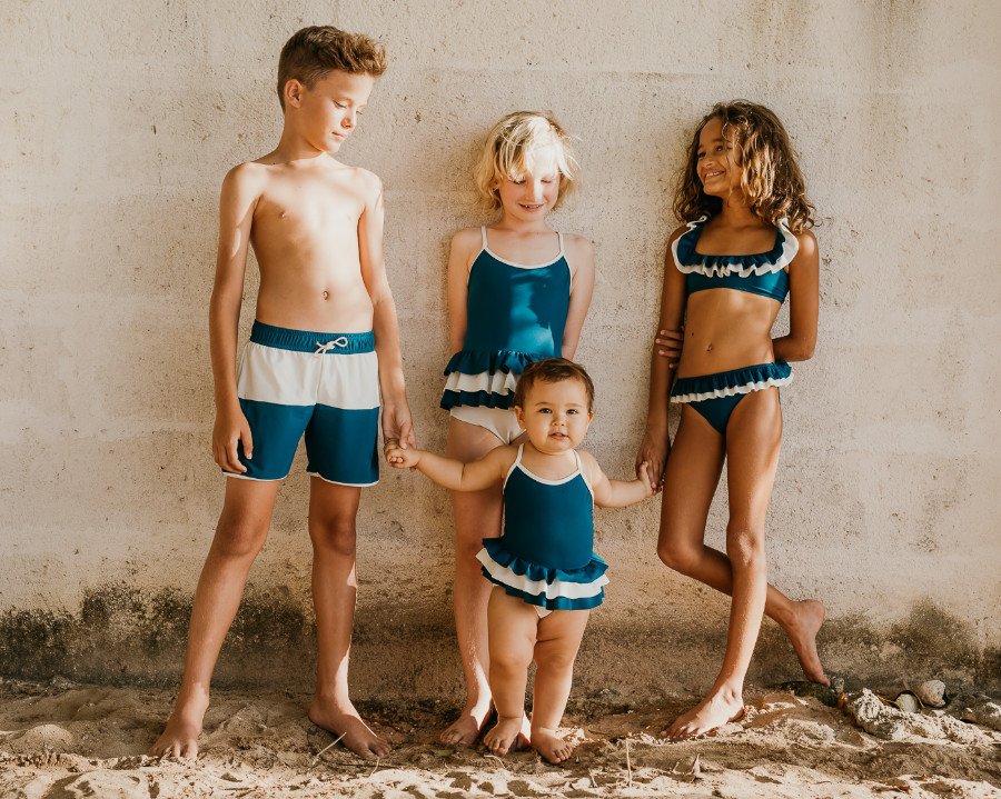 Die Swimwear von FOLPETTO, venezianisch für kleiner Oktopus, ist so robust dass sie nach dem "Hand-Me-Down"-Prinizip an Geschwister vererbt werden kann
